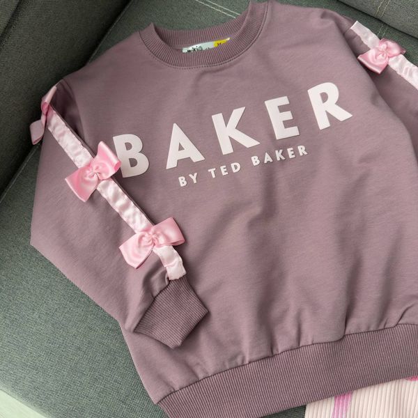 Костюм "Baker" для дівчинки 134/140 розмір 2002 фото